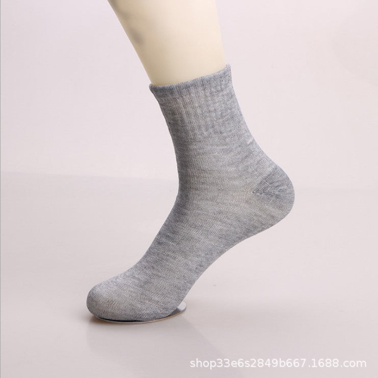 Individually packed socks men autumn and winter solid color men's cotton socks men's socks wholesale sports long tube socks men