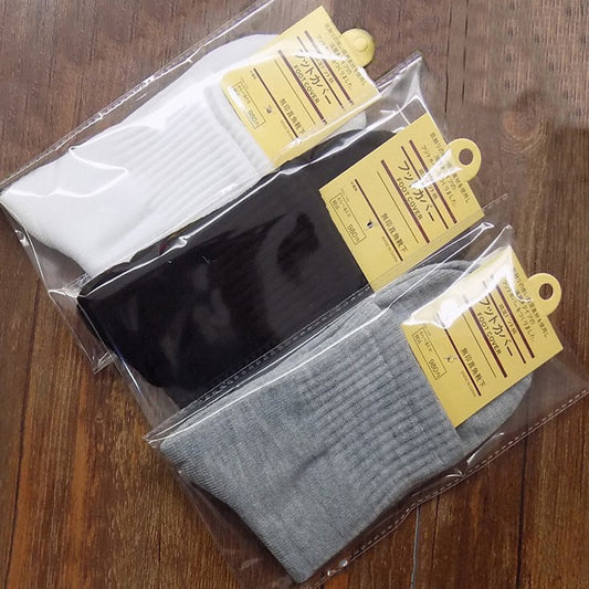 Individually packed socks men autumn and winter solid color men's cotton socks men's socks wholesale sports long tube socks men