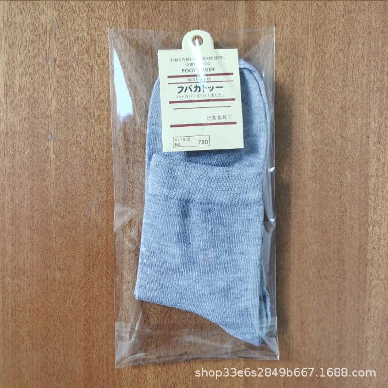 Individually packed socks men autumn and winter solid color men's cotton socks men's socks wholesale sports long tube socks men