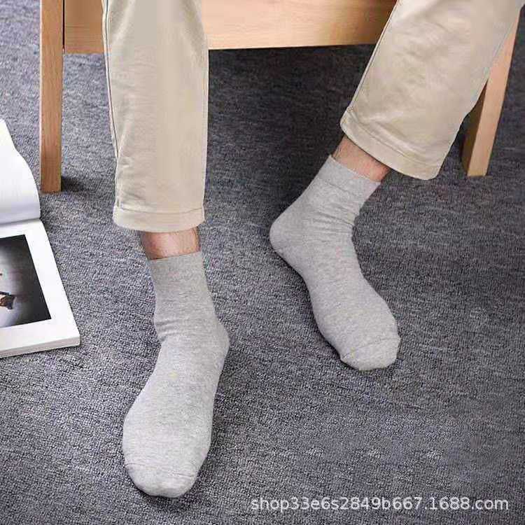 Individually packed socks men autumn and winter solid color men's cotton socks men's socks wholesale sports long tube socks men